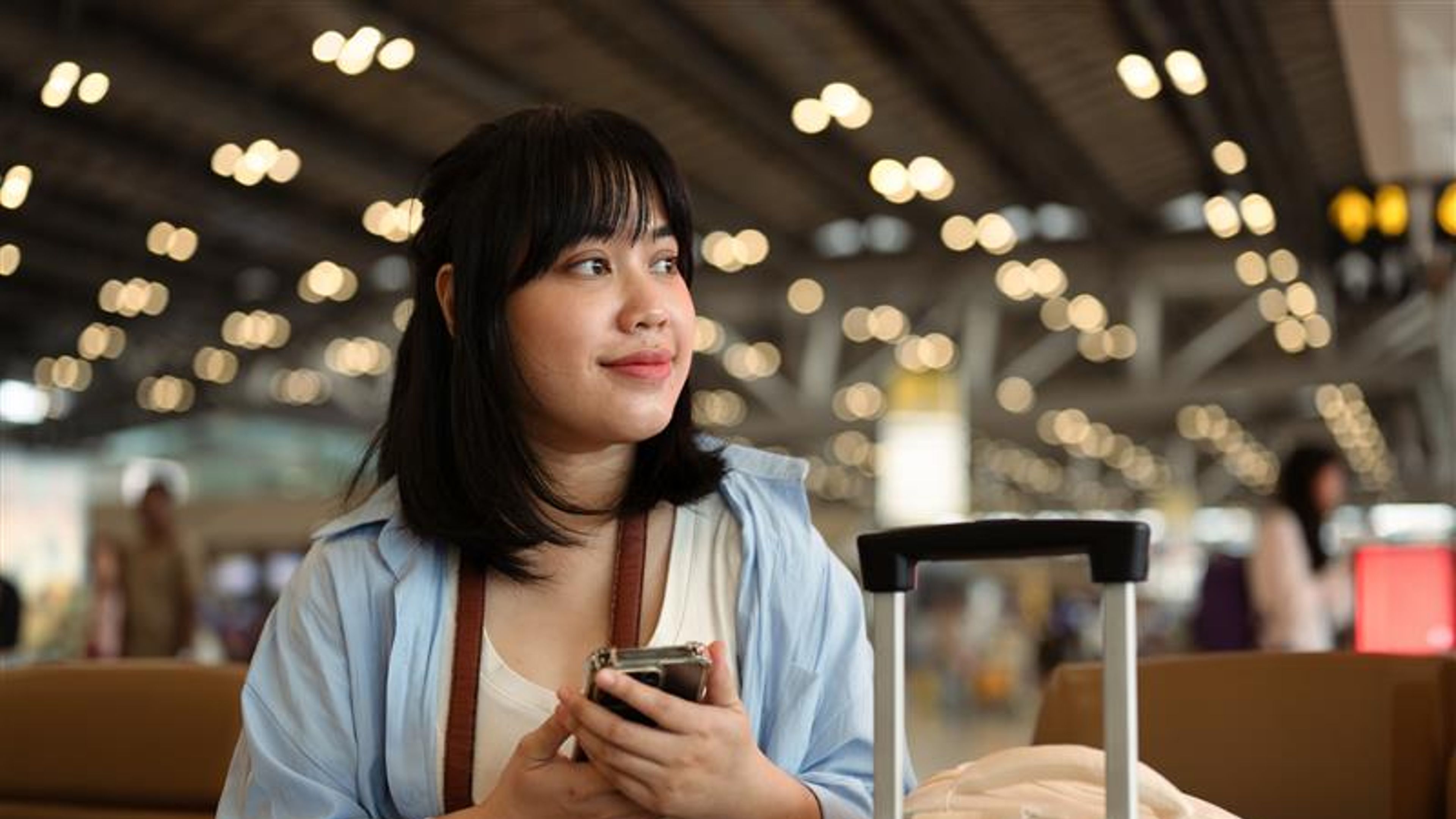 A young woman waiting at airport